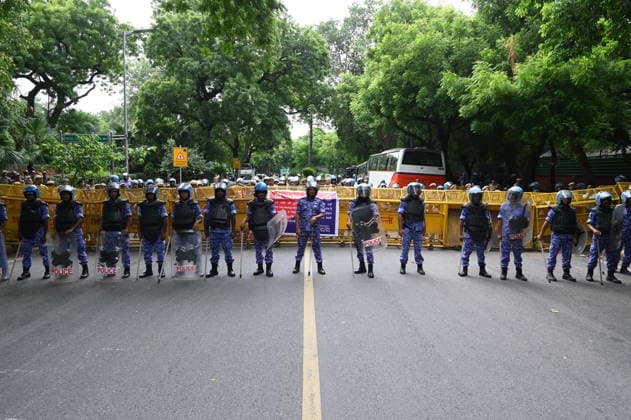 NEW DELHI, INDIA - AUGUST 3: Security forces deployed during protest march by NSUI members from the Indian Youth Congress office towards Jantar Mantar condemning police action against student demonstrators during the recent July 20 Parliament march on August 3, 2026 in New Delhi, India. The student wing of the Congress party demanded a thorough judicial probe into the alleged police crackdown, lathi-charge, and use of teargas and pellet guns against student protesters during the July 20 Parliament march. The demonstrators also demanded the immediate withdrawal of FIRs registered against student activists. (Photo by Ishant Chauhan Hindustan Times) NSUI Protest March Against Alleged Use Of Force And Pellet Guns Against Students