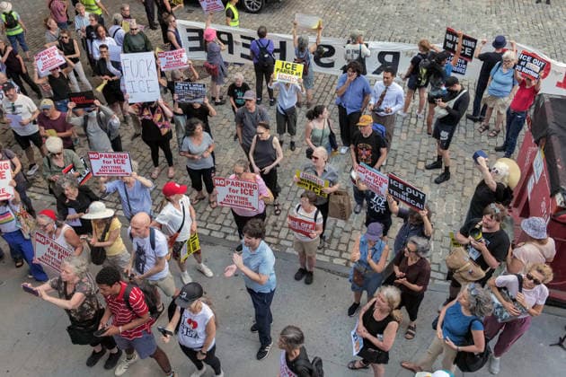 August 3, 2026, New York, New York, USA: Tribeca residents and supporters demonstrate against ICE vehicles parking at ICON Parking garage.on Harrison Street in IPN Plaza Tribeca. It is believed the garage holds a fleet of new unlicensed SUV s.the type ICE uses in their arrest deportation operations. The garage is close to their offices at 26 Federal Plaza and the .ICE Field Offices on Varick Street. New York USA  - ZUMAh156 20260803_znp_h156_001 Copyright: xMiloxHessx