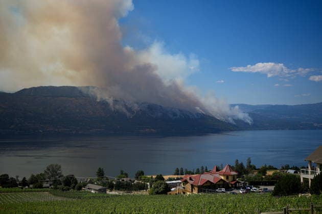 August 3, 2026, Lake Country, Bc, CANADA: The Quilpituk Creek wildfire burns on the mountainside near Fintry, B.C., across Okanagan Lake from Gray Monk Estate Winery, in Lake Country, Monday, Aug. 3, 2026. Lake Country CANADA  - ZUMAc35_ 20260803_zaf_c35_086 Copyright: xDarrylxDyckx