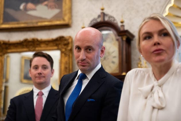 August 3, 2026, Washington, District Of Columbia, USA: WASHINGTON, DC - AUG. 3: Stephen Miller, White House Deputy Chief of Staff for Policy and US Homeland Security Advisor and White House press secretary Karoline Leavitt, right, look on as U.S. President Donald Trump announces an executive order establishing the Presidential Military Spouse Commission on Monday, Aug. 3, 2026 in the Oval Office at the White House in Washington, D.C Washington USA  - ZUMAs152 20260803_faa_s152_022 Copyright: xAllisonxRobbertxx-xPoolxviaxCNPx