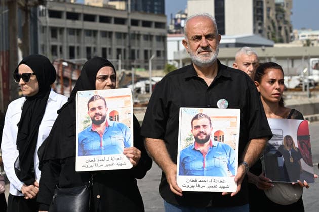 Memorial ceremony held in Lebanon to mark sixth anniversary of Beirut Port explosion BEIRUT, LEBANON - AUGUST 4: People attend a memorial ceremony held in front of the monument bearing the names of those killed in the Aug. 4, 2020 Beirut Port explosion, marking the sixth anniversary of the disaster while holding photos, in Beirut, Lebanon, on August 4, 2026. The ceremony was attended by families of the victims, Lebanese Justice Minister Adel Nassar, Information Minister Paul Markus, Social Affairs Minister Haneen El Sayed, ambassadors of several countries that lost citizens in the explosion, and other members of the diplomatic corps. Houssam Shbaro Anadolu Beirut Lebanon. Editorial use only. Please get in touch for any other usage.  Copyright: x2026xAnadoluxHoussamxShbarox