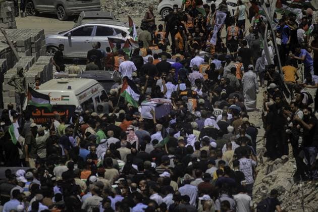RECORD DATE NOT STATED Palestinians Hold Mass Funeral for 112 Members of One Family Killed During Gaza War (INT) Palestinians Hold Mass Funeral for 112 Members of One Family Killed During Gaza War AUGUST 4, 2026, Gaza, Palestine: Palestinians hold a funeral procession for the remains of 112 members of the Abu Naser family, who were killed in an Israeli attack during the war that began on October 7, 2023. The victims bodies were recovered after remaining beneath the rubble for months. According to local officials, the procession was the largest funeral held in the Palestinian territories since the start of the conflict. Credit: Hashem Zimmo TheNews2(Foto: Hashem Zimmo Thenews2 imago images) Palestinians Hold Mass Funeral for 112 Members of One Family Killed Durin  Copyright: xHashemxZimmox