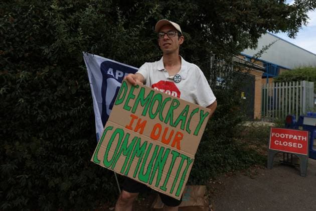 August 4, 2026, London, England, United Kingdom: Members of the App Drivers & Couriers Union (ADCU), Brent Green Party and the Pull the Plug on Waymo campaign attend a protest outside WAYMO s offices in Park Royal, London, opposing the expansion of autonomous vehicles. Demonstrators argued that driverless technology threatens drivers job security and livelihoods and called for greater protections for workers rights. London United Kingdom  - ZUMAa279 20260804_zsp_a279_006 Copyright: xZeynepxDemirxAslimx