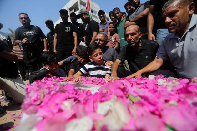 Mass funeral held for recovered remains in Gaza City s Sabra neighborhood Palestinians take part in a mass funeral for the recovered remains of members of the Abu Sharia and Al-Hasayna families in the Sabra neighborhood of Gaza City on August 4, 2026. The remains were recently recovered from beneath the rubble of their homes, which were destroyed in an Israeli strike earlier in the war. Gaza s Civil Defense said its crews recovered the remains of 112 people during a two-week operation in the residential area where the two families lived, which it said was hit in an Israeli airstrike on November 23, 2023. The Civil Defense estimates that more than 9,000 people remain missing or buried beneath the rubble of destroyed buildings across the Gaza Copyright: xapaimagesxBilalxOsamax xapaimagesx