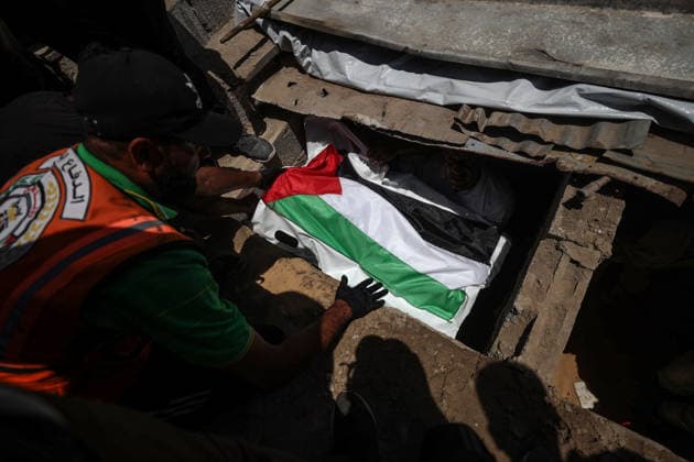 Palestinians mourn 112 people retrieved from rubble in Gaza GAZA, PALESTINE - AUGUST 04: Palestinians carry the bodies of 112 Palestinians during a mass funeral ceremony in Gaza, Palestine, on August 04, 2026. The 112 Palestinians were killed in Israeli attacks targeting the area where the Hasayine and Abu Sharia families lived in the Sabra neighborhood of Gaza City in November 2023 and were retrieved from the rubble nearly three years later. Ali Jadallah Anadolu Gaza Palestine. Editorial use only. Please get in touch for any other usage.  Copyright: x2026xAnadoluxAlixJadallahx