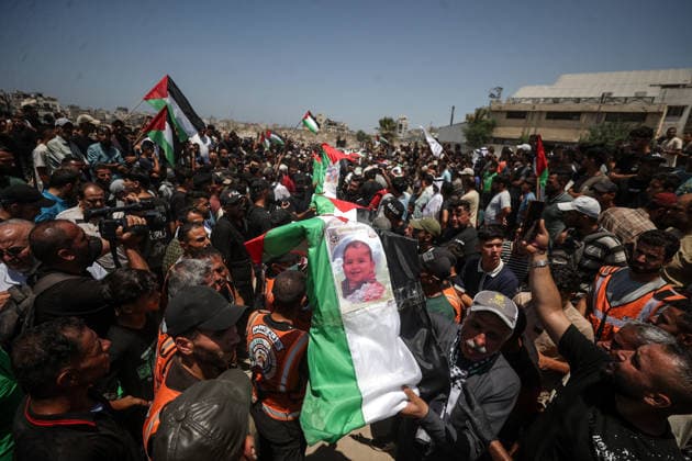 Palestinians mourn 112 people retrieved from rubble in Gaza GAZA, PALESTINE - AUGUST 04: Palestinians take part in a funeral for 112 Palestinians in Gaza, Palestine, on August 04, 2026. The 112 Palestinians were killed in Israeli attacks targeting the area where the Hasayine and Abu Sharia families lived in the Sabra neighborhood of Gaza City in November 2023, and their bodies were retrieved from the rubble nearly three years later. Ali Jadallah Anadolu Gaza Palestine. Editorial use only. Please get in touch for any other usage.  Copyright: x2026xAnadoluxAlixJadallahx