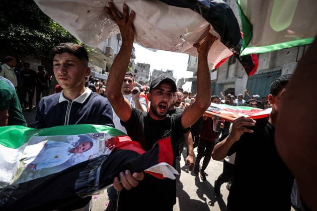 Palestinians mourn 112 people retrieved from rubble in Gaza GAZA, PALESTINE - AUGUST 04: Palestinians take part in a funeral for 112 Palestinians in Gaza, Palestine, on August 04, 2026. The 112 Palestinians were killed in Israeli attacks targeting the area where the Hasayine and Abu Sharia families lived in the Sabra neighborhood of Gaza City in November 2023, and their bodies were retrieved from the rubble nearly three years later. Ali Jadallah Anadolu Gaza Palestine. Editorial use only. Please get in touch for any other usage.  Copyright: x2026xAnadoluxAlixJadallahx