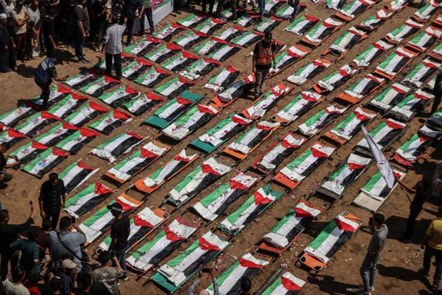 Palestinians mourn 112 people retrieved from rubble in Gaza GAZA, PALESTINE - AUGUST 04: Palestinians take part in a funeral for 112 Palestinians in Gaza, Palestine, on August 04, 2026. The 112 Palestinians were killed in Israeli attacks targeting the area where the Hasayine and Abu Sharia families lived in the Sabra neighborhood of Gaza City in November 2023, and their bodies were retrieved from the rubble nearly three years later. Ali Jadallah Anadolu Gaza Palestine. Editorial use only. Please get in touch for any other usage.  Copyright: x2026xAnadoluxAlixJadallahx