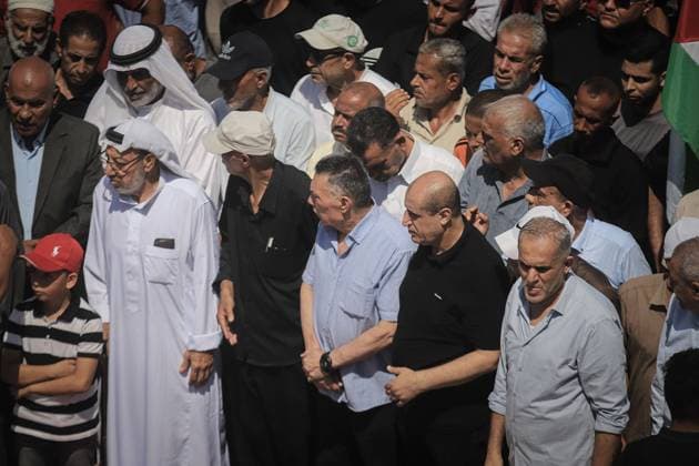 August 4, 2026, Gaza, Palestine, State of: GAZA Gaza, PALESTINE Ã¢â‚¬ August 4, 2026: Palestinians carry the remains of 112 members of the Al-Hassaina and Abu Sharia families during a mass funeral procession in the Al-Sabra neighborhood of Gaza City on August 4, 2026. The victims were killed in separate Israeli attacks during the war that began on October 7, 2023, and their bodies were recovered from beneath the rubble months later. According to local authorities, the procession was among the largest funeral processions held in the Gaza Strip since the beginning of the war. Gaza Palestine, State of  - ZUMAq101 20260804_zna_q101_005 Copyright: xMohammedxMxSkaikx