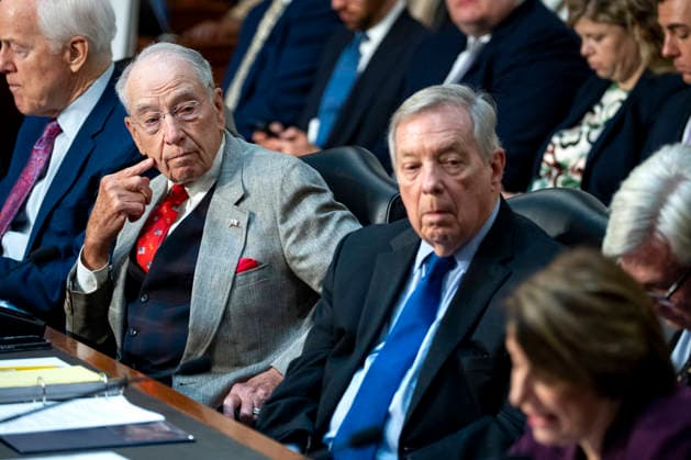 Chair of the Senate Judiciary Committee Sen. Chuck Grassley, R-IA, (L) and Ranking Member Sen. Dick Durbin, D-IL, look on as Sen. Amy Klobuchar, D-MN, speaks during a Senate Judiciary Committee business meeting to vote on Acting Attorney General Todd Blanche s nomination to be Attorney General at the U.S. Capitol in Washington, DC on Tuesday, August 4, 2026. Blanche s nomination had been held up over concerns from Sen. John Cornyn, R-TX, and Sen. Thom Tillis, R-NC, but they reached a deal to end the standoff after Blanche agreed to withhold President Donald Trump s $1.8 billion anti-weaponization fund.  WAP20260804313 BONNIExCASH