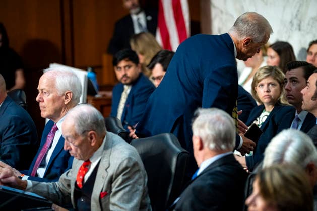 Sen. Thom Tillis, R-NC, (R) speaks with members of his staff as Sen. John Cornyn, R-TX, (R) looks on during a Senate Judiciary Committee business meeting to vote on Acting Attorney General Todd Blanche s nomination to be Attorney General at the U.S. Capitol in Washington, DC on Tuesday, August 4, 2026. Blanche s nomination had been held up over concerns from Cornyn and Tillis, but they reached a deal to end the standoff after Blanche agreed to withhold President Donald Trump s $1.8 billion anti-weaponization fund.  WAP20260804316 BONNIExCASH