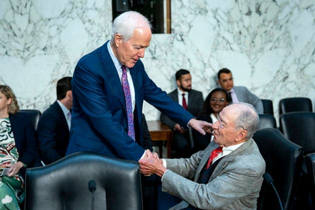 Chair of the Senate Judiciary Committee Sen. Chuck Grassley, R-IA, shakes hands with Sen. John Cornyn, R-TX, ahead of a Senate Judiciary Committee business meeting to vote on Acting Attorney General Todd Blanche s nomination to be Attorney General at the U.S. Capitol in Washington, DC on Tuesday, August 4, 2026. Blanche s nomination had been held up over concerns from Cornyn and Sen. Thom Tillis, R-NC, but they reached a deal to end the standoff after Blanche agreed to withhold President Donald Trump s $1.8 billion anti-weaponization fund.  WAP20260804319 BONNIExCASH