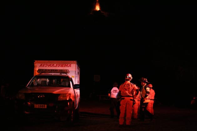 Fuego Volcano enters eruption phase in Guatemala ALOTENANGO, GUATEMALA - AUGUST 4: Emergency responders stand beside an ambulance as Volcan de Fuego erupts in the background in Alotenango, Guatemala, on August 4, 2026. Authorities evacuated residents from nearby communities as increased volcanic activity prompted emergency response operations. Josue Decavele Anadolu Alotenango Guatemala. Editorial use only. Please get in touch for any other usage.  Copyright: x2026xAnadoluxJosuexDecavelex