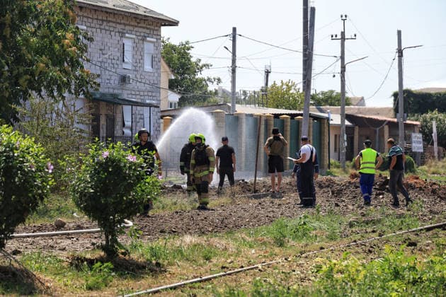 First responders deal with the consequences of a Russian missile attack, Odesa, Ukraine, August 4, 2026. Russian forces carried out a missile strike near a market on the outskirts of the city. Civilian infrastructure was damaged, and at least three people were injured. (Photo by Nina Liashonok Ukrinform) Russia attacks suburbs of Odesa with missiles  Copyright: xNinaxLiashonokx
