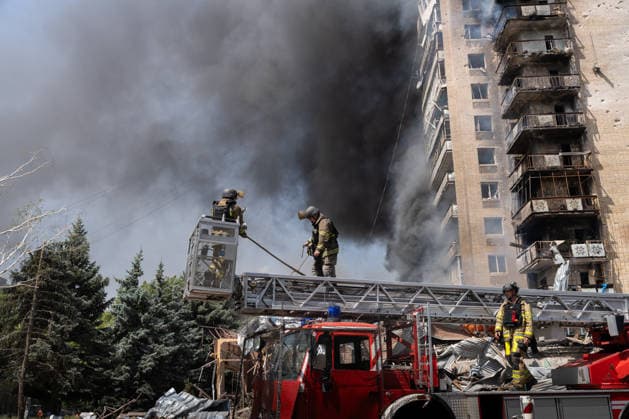 August 4, 2026, Kramatorsk, Donetsk Oblast, Ukraine: Emergency services work to aid the community after Russia launches an attack on residential buildings in the city of Kramatorsk, Donetsk Oblast. Kramatorsk Ukraine - ZUMAm350 20260804_zip_m350_041 Copyright: xCameronxJones-Manleyx