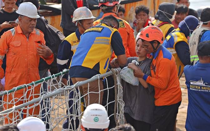 August 4, 2026, Surabaya, Indonesia: SURABAYA, EAST JAVA, INDONESIA Ã¢â‚¬ AUGUST 4, 2026: Survivors of the KM Mutiara Sentosa II ferry fire arrive at Tanjung Perak Port aboard the KM Masalembo in Surabaya, East Java, Indonesia, on August 4, 2026. Survivors described a chaotic evacuation, saying passengers received little or no guidance from the crew, searched for life jackets on their own, and some jumped into the sea before drifting for hours until they were rescued. Their accounts contrast with information provided by the ferry operator to the Indonesian National Search and Rescue Agency (BASARNAS), which stated that all 238 passengers were wearing life jackets during the evacuation. According to BASARNAS, 233 people survived and five - ZUMAq101 20260804_zna_q101_090 Copyright: xAndrexYurisx