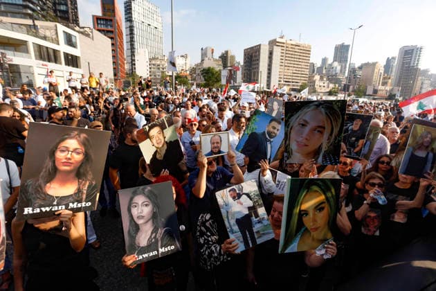August 4, 2026, Beirut, Beirut, lebanon: Families of victims of the 2020 Beirut Port explosion take part in a central memorial march marking the sixth anniversary of the disaster in Beirut, Lebanon, on August 4, 2026. The march begins at the Beirut Fire Brigade while a second procession starts from Martyrs Square, with both converging near the Emigrant Statue facing the Beirut Port. Participants carry portraits of their relatives who were killed in the massive explosion as they continue to demand truth and justice Beirut lebanon - ZUMAb339 20260804_znp_b339_012 Copyright: xAbdulxKaderxAlxBayx