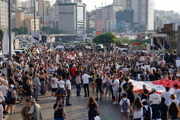 August 4, 2026, Beirut, Beirut, lebanon: Families of victims of the 2020 Beirut Port explosion take part in a central memorial march marking the sixth anniversary of the disaster in Beirut, Lebanon, on August 4, 2026. The march begins at the Beirut Fire Brigade while a second procession starts from Martyrs Square, with both converging near the Emigrant Statue facing the Beirut Port. Participants carry portraits of their relatives who were killed in the massive explosion as they continue to demand truth and justice Beirut lebanon - ZUMAb339 20260804_znp_b339_014 Copyright: xAbdulxKaderxAlxBayx