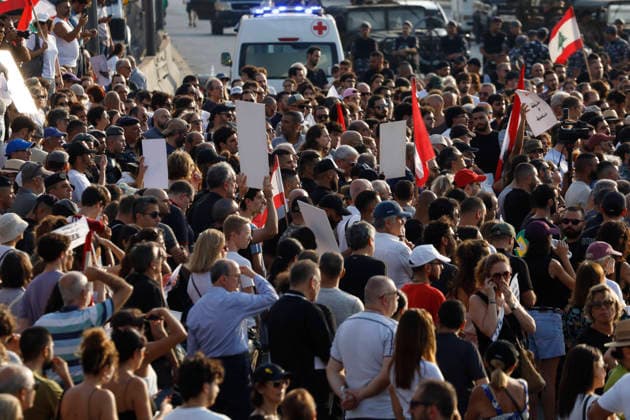 August 4, 2026, Beirut, Beirut, lebanon: Families of victims of the 2020 Beirut Port explosion take part in a central memorial march marking the sixth anniversary of the disaster in Beirut, Lebanon, on August 4, 2026. The march begins at the Beirut Fire Brigade while a second procession starts from Martyrs Square, with both converging near the Emigrant Statue facing the Beirut Port. Participants carry portraits of their relatives who were killed in the massive explosion as they continue to demand truth and justice Beirut lebanon - ZUMAb339 20260804_znp_b339_015 Copyright: xAbdulxKaderxAlxBayx
