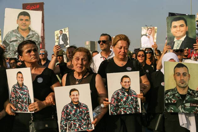 August 4, 2026, Beirut, Beirut, Lebanon: Mothers of fire fighters, who were killed in the 2020 Beirut port blast, hold the pictures of their sons during a ceremony to mark the six anniversary of the massive explosion that killed more than 200 people and injuring more than 6,500 others. Lebanese authorities have said the explosion was triggered by a fire in a warehouse where tones of ammonium nitrate fertilizer had been stored haphazardly for years, despite repeated warnings to senior officials. Beirut Lebanon - ZUMAn313 20260804_zip_n313_006 Copyright: xMarwanxNaamanix