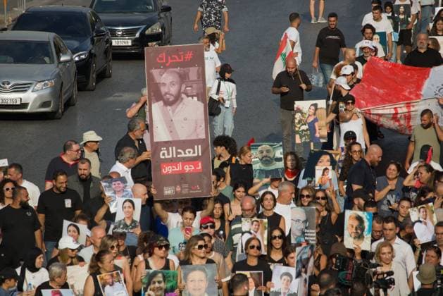 Beirut Port Explosion Commemoration BEIRUT, LEBANON - August 4: Marches carry photographs of the victims of the Aug. 4, 2020 Beirut Port explosion as they walk to the port during commemorations for the sixth anniversary of the blast. Beirut LB Copyright: x xNicholasxFrakesx xJNAxPressx