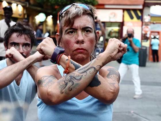 August 4, 2026, Madrid, Madrid, Spain: MADRID, SPAIN - AUGUST 04: Under the slogan Ã¢â‚¬oeBorders Kill,Ã¢â‚¬Â around a hundred people gathered in Plaza de Lavapio s in Madrid to demonstrate over the nearly 100 people who died attempting to cross from Morocco to Spain by sea. Madrid Spain - ZUMAh199 20260804_zip_h199_004 Copyright: xAaronxHerediax