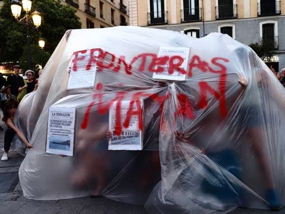 August 4, 2026, Madrid, Madrid, Spain: MADRID, SPAIN - AUGUST 04: Under the slogan Ã¢â‚¬oeBorders Kill,Ã¢â‚¬Â around a hundred people gathered in Plaza de Lavapio s in Madrid to demonstrate over the nearly 100 people who died attempting to cross from Morocco to Spain by sea. Madrid Spain - ZUMAh199 20260804_zip_h199_013 Copyright: xAaronxHerediax