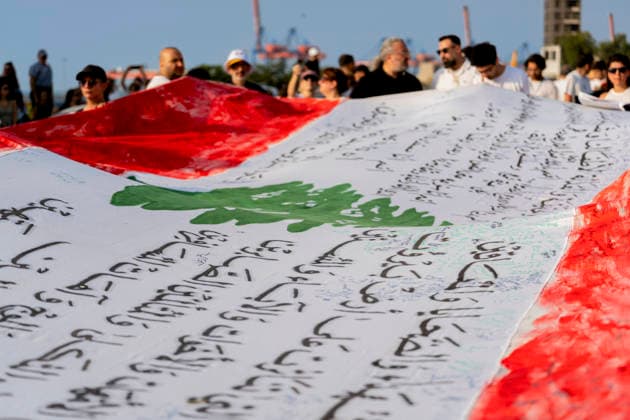 Beirut Lebanon Blast Anniversary A Lebanese flag covered with handwritten messages is displayed during a commemoration marking the sixth anniversary of the Beirut port explosion in Beirut, Lebanon on August 4, 2026. The blast killed more than 220 people, injured thousands and displaced hundreds of thousands, while victims™ families continue to demand justice and accountability. Beirut Beirut Lebanon Copyright: xSilviaxCasadeix