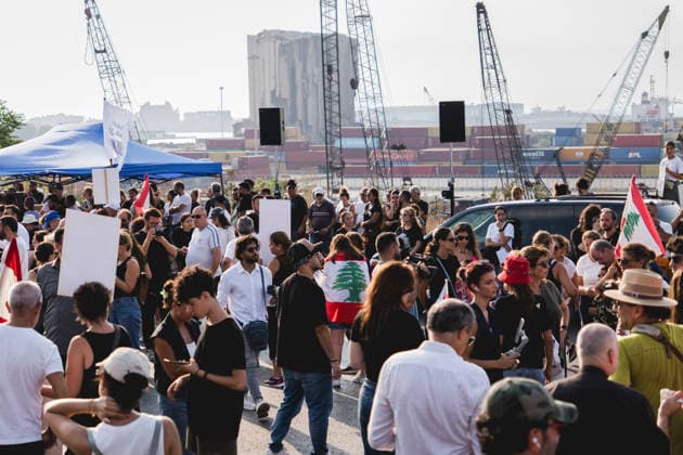 Beirut Port Blast Anniversary Commemoration People gather near Beirut port carrying Lebanese flags, placards and portraits during a commemoration marking the sixth anniversary of the Beirut Port explosion in Beirut, Lebanon, on August 4, 2026. The August 4, 2020 blast, caused by ammonium nitrate stored at the port, killed more than 200 people, injured thousands and devastated large parts of the Lebanese capital. Beirut Beirut Lebanon Copyright: xManonxRocax