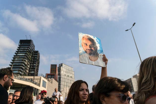 Beirut Lebanon Blast Anniversary A participant holds a portrait among the crowd during a commemoration marking the sixth anniversary of the Beirut port explosion in Beirut, Lebanon on August 4, 2026. The blast killed more than 220 people, injured thousands and displaced hundreds of thousands, while victims™ families continue to demand justice and accountability. Beirut Beirut Lebanon Copyright: xSilviaxCasadeix