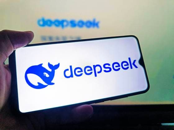 DeepSeek SUQIAN, CHINA - AUGUST 5, 2026 - A netizen is using his mobilephone to view DeepSeek logo and using his computer to view DeepSeek webpage in Suqian, Jiangsu, China on August 5, 2026. Suqian Jiangsu China  Copyright: xCFOTOx i1785933363154