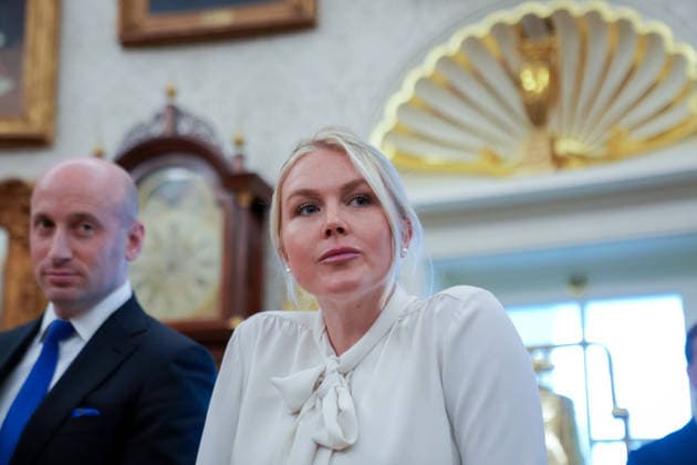 Trump Executive Order Establishing the Presidential Military Spouse Commission WASHINGTON, DC - AUG. 3: Stephen Miller, White House Deputy Chief of Staff for Policy and US Homeland Security Advisor and White House press secretary Karoline Leavitt, right, look on as U.S. President Donald Trump announces an executive order establishing the Presidential Military Spouse Commission on Monday, Aug. 3, 2026 in the Oval Office at the White House in Washington, D.C. Credit: CNP AdMedia Washington District of Columbia United States of America EDITORIAL USE ONLY  Copyright: xx CNPx xAdMediax admphotosthree009031