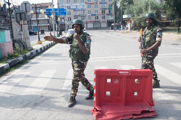 August 5, 2026, Srinagar, Jammu And Kashmir, India: Security personnel near temporary checkpointon the seventh anniversary of the abrogation of Article 370 and Jammu and Kashmir s special status,in Srinagar, Jammu and Kashmir, India, on August 5, 2026. Today marks the seventh anniversary of the abrogation of Article 370. On August 5, 2019, the Government of India revokes Article 370 of the Constitution, which grants special status to Jammu and Kashmir, and bifurcates the state into two union territories--Jammu and Kashmir, and Ladakh. Srinagar India  - ZUMAz120 20260805_zip_z120_010 Copyright: xBasitxZargarx