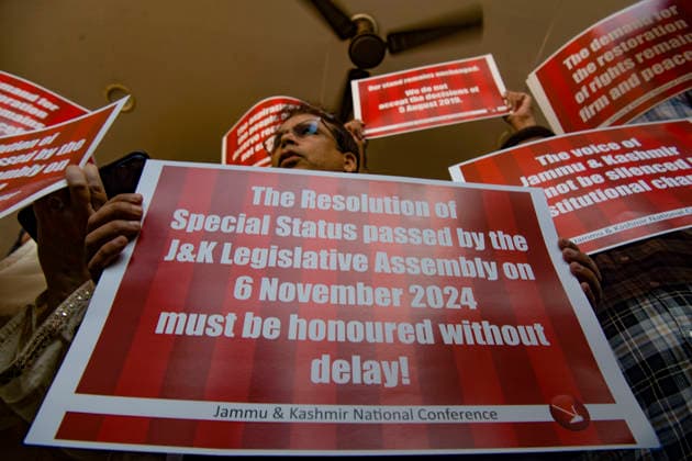 August 5, 2026, Srinagar, Jammu And Kashmir, India: National Conference leaders and workers hold placards during a protest marking the seventh anniversary of the abrogation of Article 370 and the revocation of Jammu and Kashmir s special status, in Srinagar. Today marks the seventh anniversary of the abrogation of Article 370. On August 5, 2019, the Government of India revokes Article 370 of the Constitution, which grants special status to Jammu and Kashmir, and bifurcates the state into two union territories--Jammu and Kashmir, and Ladakh. Srinagar India - ZUMAz120 20260805_zip_z120_018 Copyright: xBasitxZargarx
