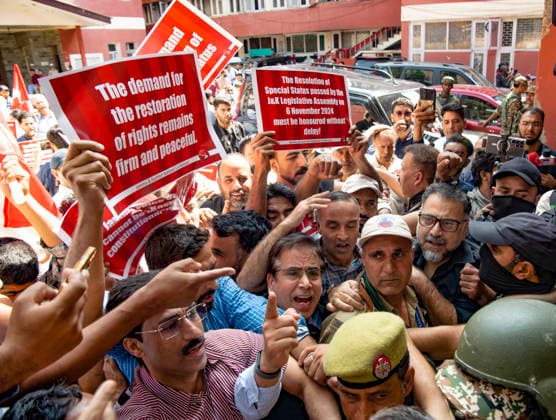 August 5, 2026, Srinagar, Jammu And Kashmir, India: Police stopped National Conference leaders and supporters as they marched during a protest against the abrogation of Article 370 and Article 35A which provided a special status to Jammu and Kashmir and against the downgrading from a state to a Union territory at NC party headquarters in Srinagar. Today marks the seventh anniversary of the abrogation of Article 370. On August 5, 2019, the Government of India revokes Article 370 of the Constitution, which grants special status to Jammu and Kashmir, and bifurcates the state into two union territories--Jammu and Kashmir, and Ladakh. Srinagar India - ZUMAz120 20260805_zip_z120_020 Copyright: xBasitxZargarx