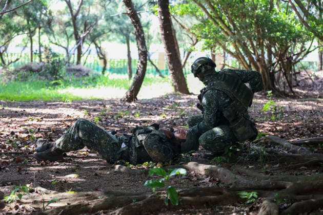 Taiwan kicks off Han-Kuang military exercises as tensions with China rise PENGHU COUNTY, TAIWAN - AUGUST 5: A Taiwanese Army soldier saves his gun-wounded fellow, during an operation simulating a response to grey-zone attacks on key infrastructure by Chinese special agents, as part of the Han-Kuang military exercise, at a power station in Penghu County, Taiwan on August 5, 2026. The Han-Kuang exercises, which kicked off today, will last for 10-days with different unscripted drills simulating response to a possible invasion by China, amid Beijing s increasing military activities around the Taiwan Strait and the South China Sea. Daniel Ceng Anadolu Penghu County Taiwan. Editorial use only. Please get in touch for any other usage.  Copyright: x2026xAnadoluxDanielxCengx
