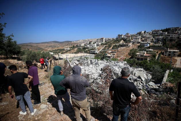 Israeli forces demolish two Palestinian homes in Nahhalin BETHLEHEM, WEST BANK, PALESTINE - AUGUST 5: Residents inspect the area as Israeli forces, accompanied by bulldozers, demolish two Palestinian homes and a commercial property after raiding the town of Nahhalin, west of Bethlehem, West Bank, Palestine, on August 5, 2026. Wisam Hashlamoun Anadolu Bethlehem West Bank. Editorial use only. Please get in touch for any other usage.  Copyright: x2026xAnadoluxWisamxHashlamounx