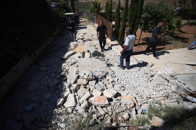 Israeli forces demolish two Palestinian homes in Nahhalin BETHLEHEM, WEST BANK, PALESTINE - AUGUST 5: Residents inspect the area as Israeli forces, accompanied by bulldozers, demolish two Palestinian homes and a commercial property after raiding the town of Nahhalin, west of Bethlehem, West Bank, Palestine, on August 5, 2026. Wisam Hashlamoun Anadolu Bethlehem West Bank. Editorial use only. Please get in touch for any other usage.  Copyright: x2026xAnadoluxWisamxHashlamounx
