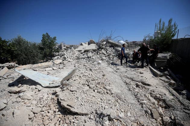 Israeli forces demolish two Palestinian homes in Nahhalin BETHLEHEM, WEST BANK, PALESTINE - AUGUST 5: Residents inspect the area as Israeli forces, accompanied by bulldozers, demolish two Palestinian homes and a commercial property after raiding the town of Nahhalin, west of Bethlehem, West Bank, Palestine, on August 5, 2026. Wisam Hashlamoun Anadolu Bethlehem West Bank. Editorial use only. Please get in touch for any other usage.  Copyright: x2026xAnadoluxWisamxHashlamounx