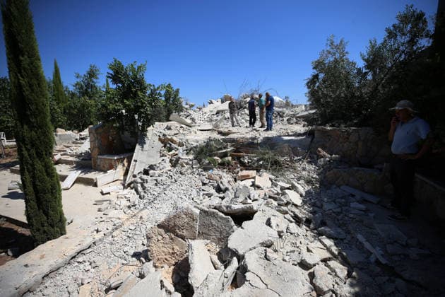 Israeli forces demolish two Palestinian homes in Nahhalin BETHLEHEM, WEST BANK, PALESTINE - AUGUST 5: Residents inspect the area as Israeli forces, accompanied by bulldozers, demolish two Palestinian homes and a commercial property after raiding the town of Nahhalin, west of Bethlehem, West Bank, Palestine, on August 5, 2026. Wisam Hashlamoun Anadolu Bethlehem West Bank. Editorial use only. Please get in touch for any other usage.  Copyright: x2026xAnadoluxWisamxHashlamounx