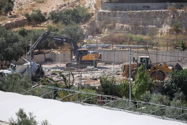Israeli army demolishes homes and industrial facility near Bethlehem NAHALIN, WEST BANK AUGUST 5, 2026: Israeli army bulldozers demolish two residential homes and an industrial facility in the village of Nahalin, west of Bethlehem, in the occupied West Bank. Israeli authorities said the structures had been built without permits in Area C, a part of the West Bank that remains under full Israeli civil and military control under the Oslo Accords. NAHALIN Palestine, State of Copyright: x xMosabxshawerx xJNAxPressx