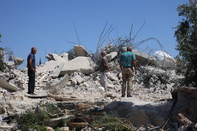 Israeli army demolishes homes and industrial facility near Bethlehem NAHALIN, WEST BANK AUGUST 5, 2026: Israeli army bulldozers demolish two residential homes and an industrial facility in the village of Nahalin, west of Bethlehem, in the occupied West Bank. Israeli authorities said the structures had been built without permits in Area C, a part of the West Bank that remains under full Israeli civil and military control under the Oslo Accords. NAHALIN Palestine, State of Copyright: x xMosabxshawerx xJNAxPressx