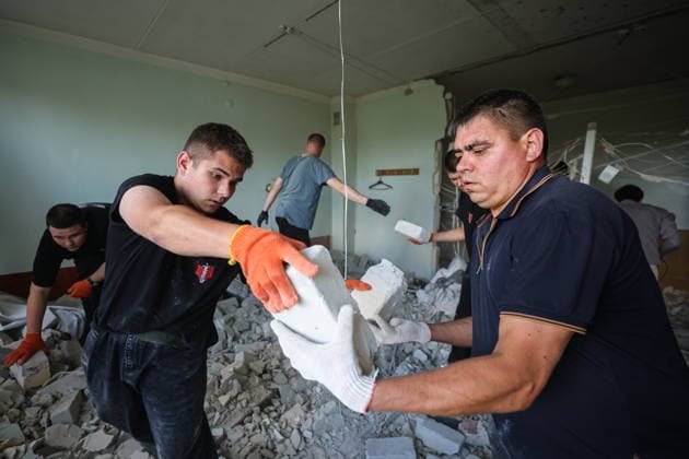 RUSSIA, DONETSK - AUGUST 5, 2026: People clear the debris in a gastroenterology ward of Donetsk City Clinical Hospital No 7 following a Ukrainian drone strike. The attack left one patient dead and two others injured. Dmitry Yagodkin TASS  95820412