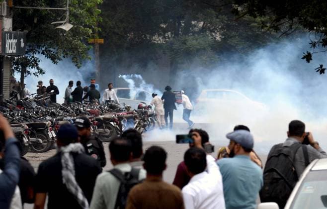 August 5, 2026, Pakistan: Police Use Baton Charge and Tear Gas to Disperse Pakistan Tehreek-e-Insaf Protesters Demanding Release of Imran Khan at Karachi Demonstration Pakistan  - ZUMAas3_ 20260805_zaf_as3_041 Copyright: xPPIx