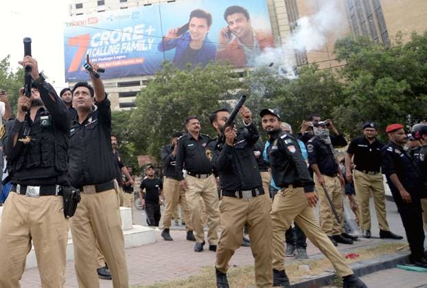 August 5, 2026, Pakistan: Police Use Baton Charge and Tear Gas to Disperse Pakistan Tehreek-e-Insaf Protesters Demanding Release of PTI Founder Imran Khan in Karachi Pakistan  - ZUMAas3_ 20260805_zaf_as3_043 Copyright: xPPIx