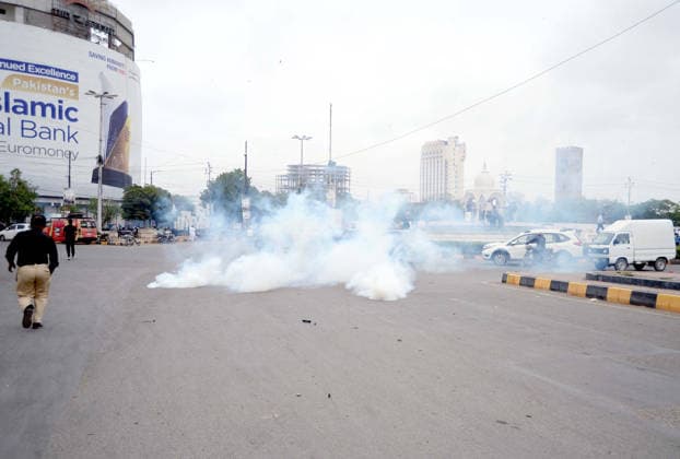 RECORD DATE NOT STATED Police officials restore baton charge, fire tear gas and arrest to repel protesters during the protest demonstration of Tehreek-e-Insaf (PTI) for release of PTI Founder Imran Khan, at Fawara Chowk nearby Karachi press club on Wednesday, August 5, 2026. Pakistan Tehreek-e-Insaf (PTI) launched countrywide protests on August 5, 2026, to mark three years of imprisonment of party founder Imran Khan and to demand his immediate release. (S.Imran Ali PPI Images). EDITORIAL USE ONLY Copyright: xx AR-ZM-050826x ppiphotos484821