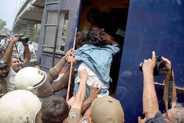 RECORD DATE NOT STATED Police officials restore baton charge and arrest to repel protesters during the protest demonstration of Tehreek-e-Insaf (PTI) for release of PTI Founder Imran Khan, at Aiwan-e-Adal road in Lahore on Wednesday, August 5, 2026. Pakistan Tehreek-e-Insaf (PTI) launched countrywide protests on August 5, 2026, to mark three years of imprisonment of party founder Imran Khan and to demand his immediate release. (Babar Shah PPI Images). EDITORIAL USE ONLY Copyright: xx AR-ZM-050826x ppiphotos484794