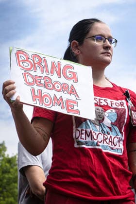 August 5, 2026, Portland, Maine, USA: Members of the Maine State Nurses Association union protest federal Immigration and Customs Enforcement (ICE) on the lawn outside Maine Medical Center, the stateÃ¢â‚¬â ¢s largest hospital, on Wednesday morning, August 5, 2026. Nurses demanded the release of colleague and medical-surgical nurse, DEBORA KAPISHA, who was detained by federal officials at Logan Airport in Boston on July 30, 2026. Union members said KAPISHA, originally from Zambia, has federal authorization to work in Maine while awaiting the outcome of her asylum case. In addition to KAPISHAÃ¢â‚¬â ¢S release, union members demanded their employer, Maine Medical Center, take immediate steps to formally sponsor KAPISHA for permanent residency. - ZUMAb349 20260805_znp_b349_003 Copyright: xTroyxR.xBennettx