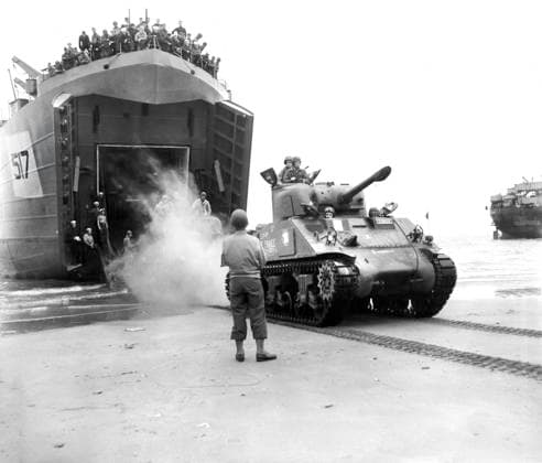 Sherman tanks, manned by French armored troops, rolling out from landing ship ramp onto Utah beach, Normandy, France, U.S. Army Signal Corps, August 2, 1944  Copyright: xCircaxImagesx ghi-circa14413