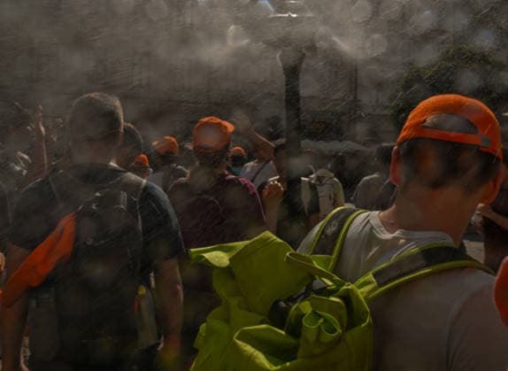 Krakow Hits 39Â°C As Severe Heatwave Triggers Red Weather Alerts Across Poland KRAKOW, POLAND - AUGUST 5: A group of youth marchers wearing matching orange caps passes a municipal water misting post in the Main Market Square (Rynek GÅ‚owny) during an intense heatwave on August 5, 2026, in Krakow, Poland. The Institute of Meteorology and Water Management (IMGW) kept its highest third-degree red alert active across the Lesser Poland Voivodeship as temperatures reached a peak of 39Â°C (102.2Â°F). Krakow Poland  Copyright: xArturxWidakx originalFilename: widak-krakowhi260805_npjVR.jpg